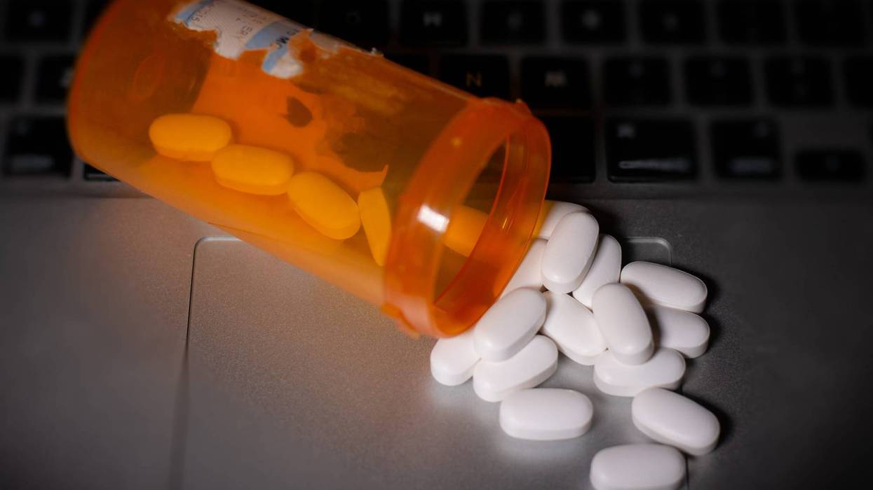 Pills on top of computer