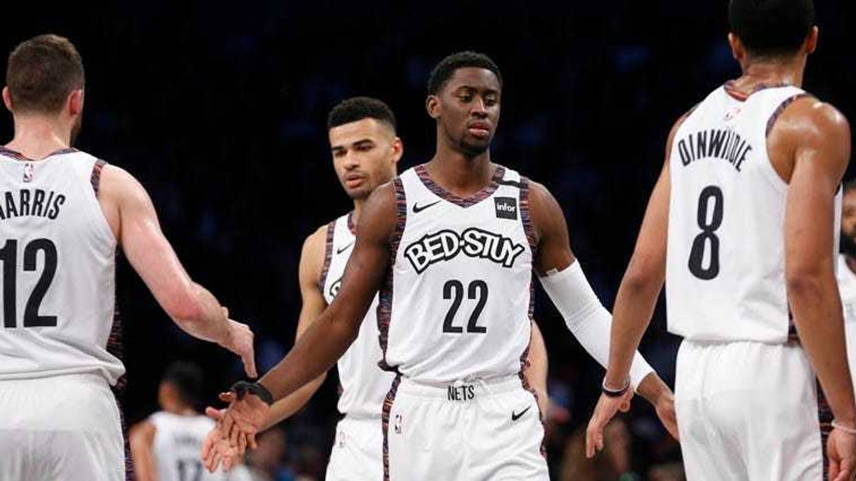 Pistons forward Blake Griffin dribbles the ball against Nets forward Rodions Kurucs on March 11, 2019, at Barclays Center.