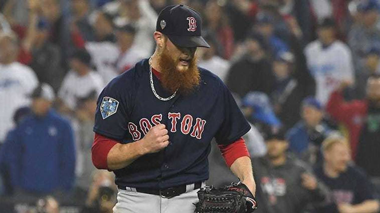 pitcher Craig Kimbrel celebrates after defeating the Los Angeles Dodgers in game four of the 2018 World Series