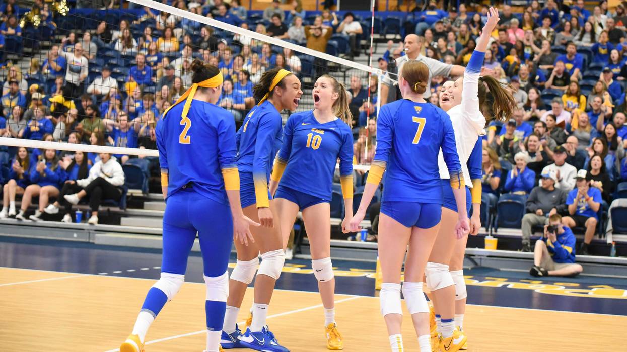 Pitt volleyball celebrating after point
