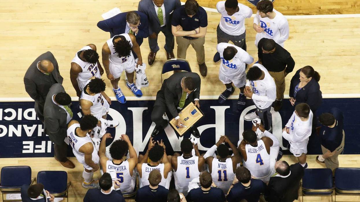 Pittsburgh Panthers head coach Jeff Capel (center) diagrams a play in the huddle during a time-out against the Clemson Tigers during the first half at the Petersen Events Center. Clemson won 62-48.