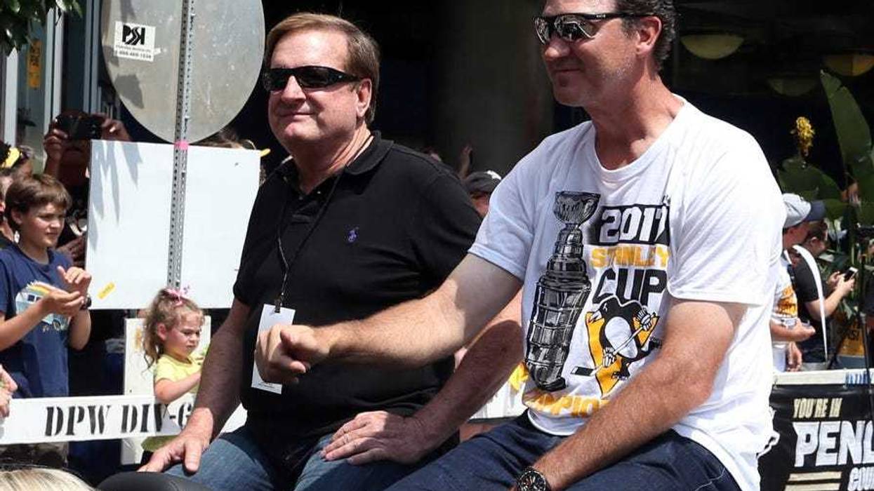 Pittsburgh Penguins owners Ron Burkle (left) and Mario Lemieux (right) take part in the Stanley Cup championship parade