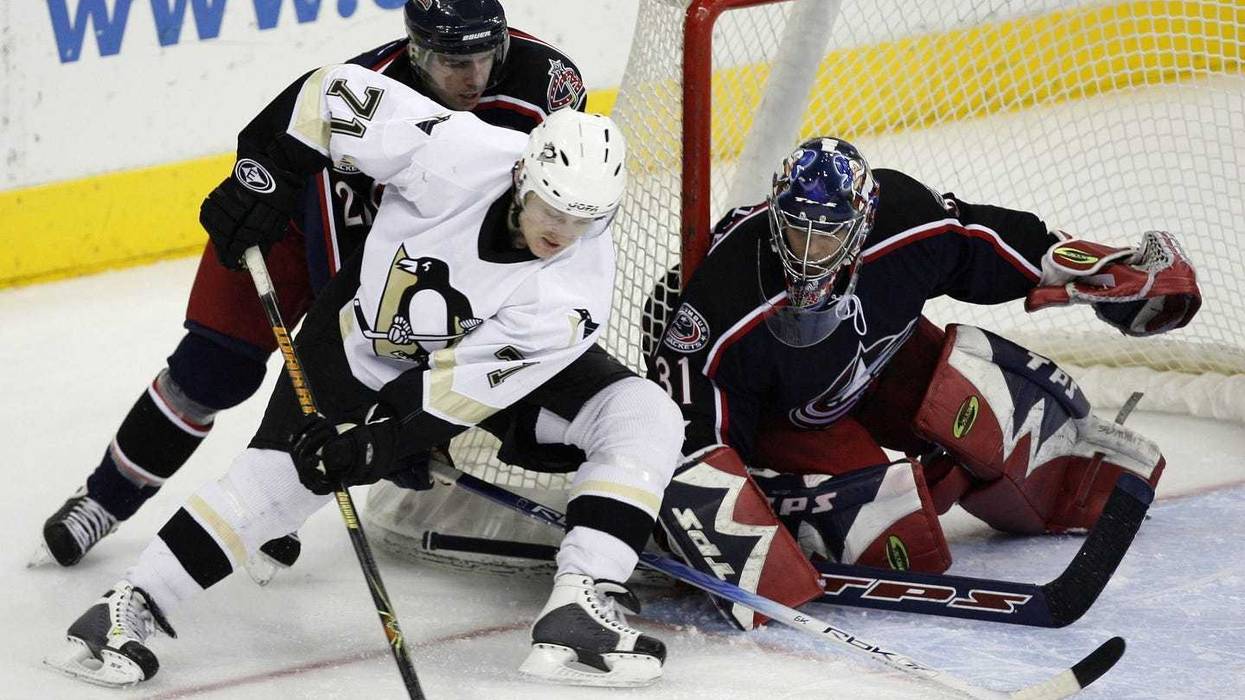 Pittsburgh Penguins right wing (71) Konstantin Koltsov gets past Columbus Blue Jackets defense man (21) Radoslav Suchy