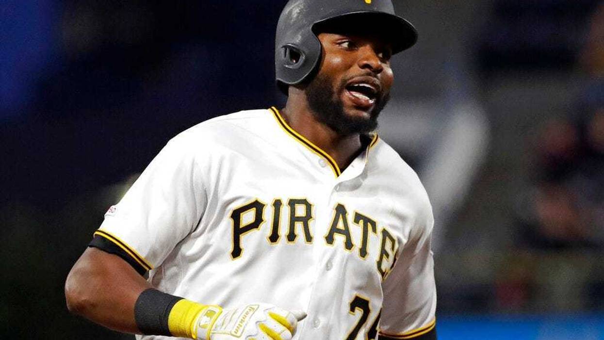 Pittsburgh Pirates' Gregory Polanco rounds third base after hitting a two-run home run off Texas Rangers starting pitcher Adrian Sampson during the fifth inning of a baseball game in Pittsburgh, Tuesday, May 7, 2019.