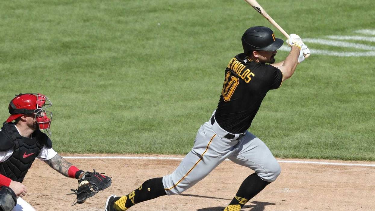 Pittsburgh Pirates left fielder Bryan Reynolds (10) hits a double against the Cincinnati Reds