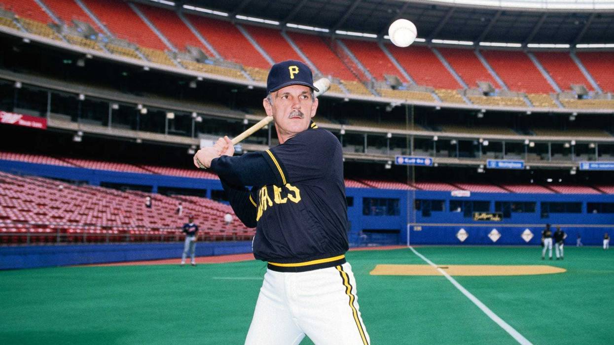 ; Pittsburgh Pirates manager Jim Leyland hits ground balls on the field prior to a game at Three Rivers Stadium