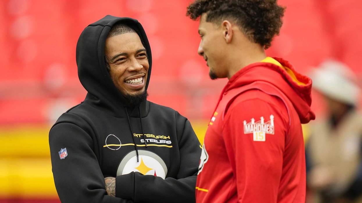 Pittsburgh Steelers cornerback Joe Haden (left) talks with Kansas City Chiefs quarterback Patrick Mahomes (15)