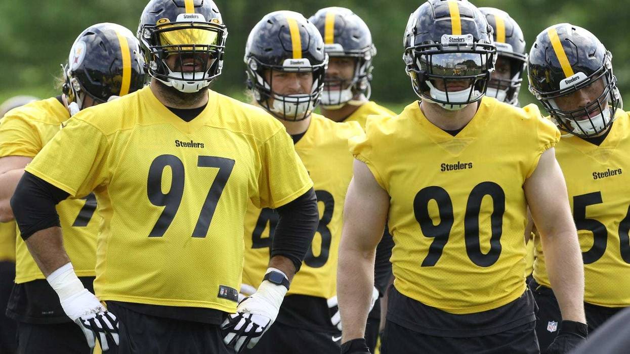 Pittsburgh Steelers defensive end Cameron Heyward (97) and linebacker TJ Watt (90) participate in organized team activities at UPMC Rooney Sports Complex.