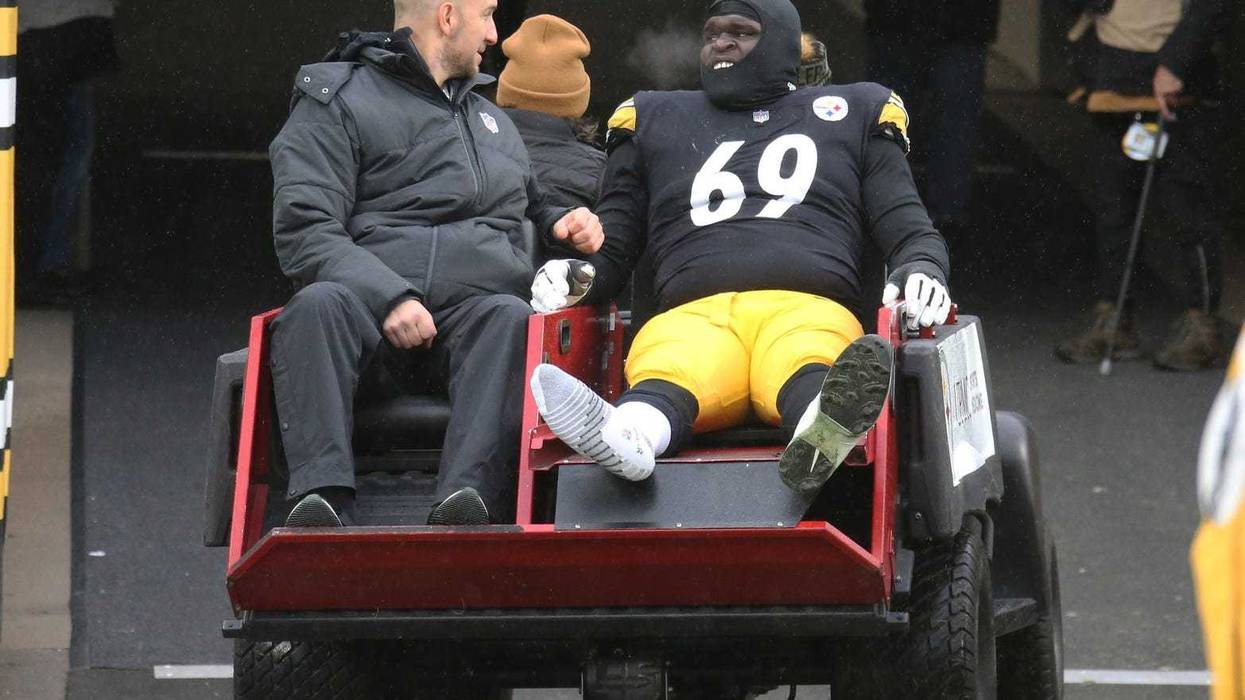 Pittsburgh Steelers guard Kevin Dotson (69) is taken from the field