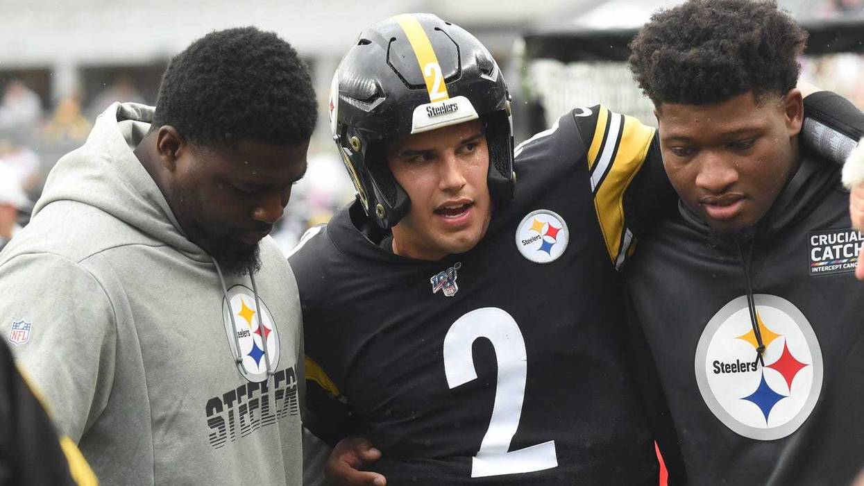 Pittsburgh Steelers quarterback Mason Rudolph (2) is led to a cart during the third quarter against the Baltimore Ravens at Heinz Field. Rudolph left the game with a concussion during the overtime vic...