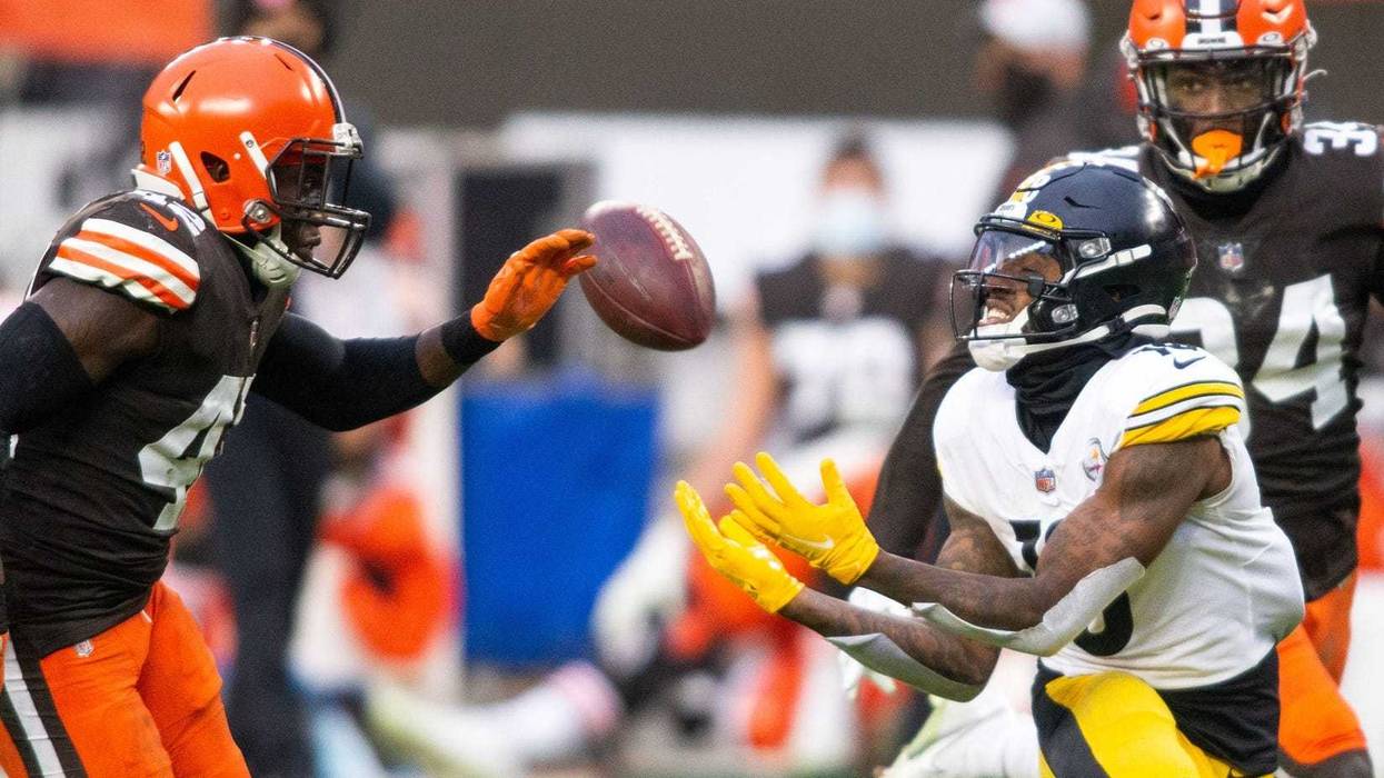 Pittsburgh Steelers wide receiver Diontae Johnson (18) makes a first down reception against Cleveland Browns strong safety Karl Joseph (42) during the fourth quarter at FirstEnergy Stadium.