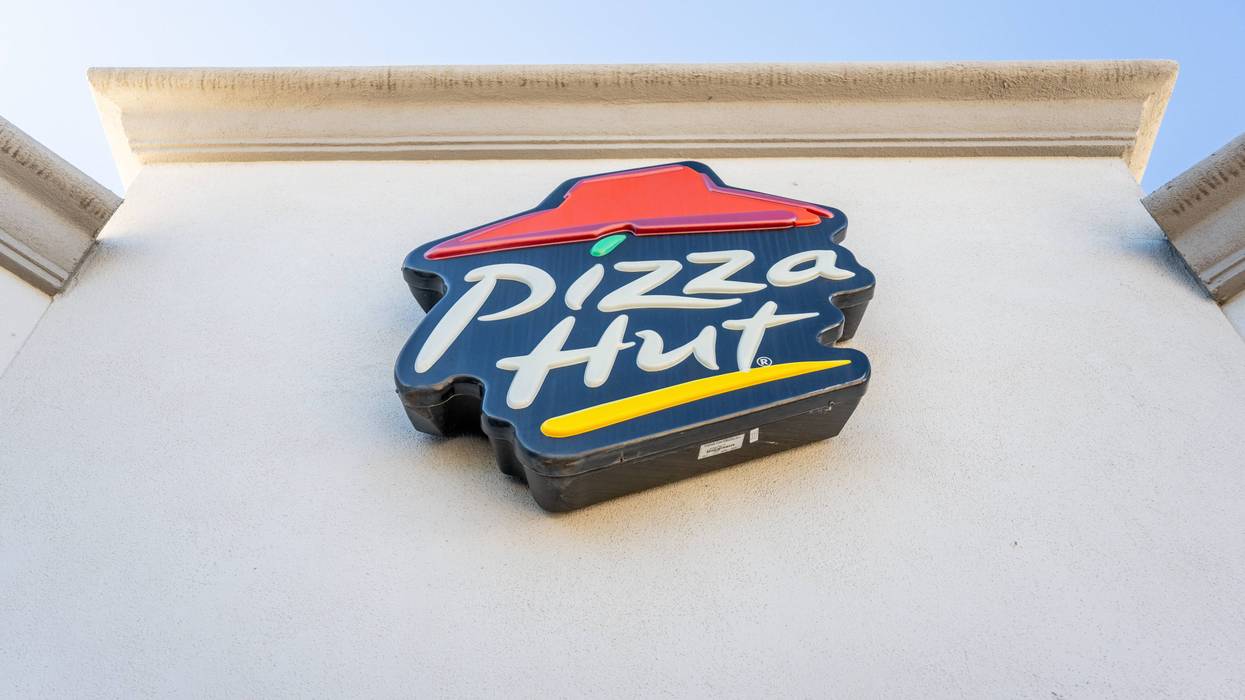 pizza hut sign on building