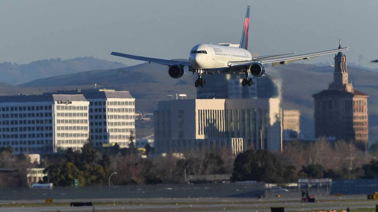 Plane comes in for landing at San Jose International Airport