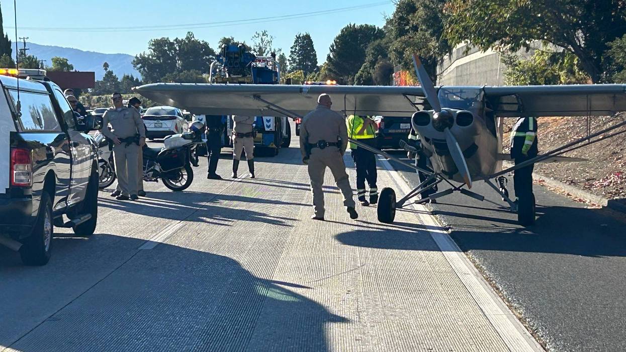 Plane sits on the side of Highway 85 in Cupertino after making an emergency landing.