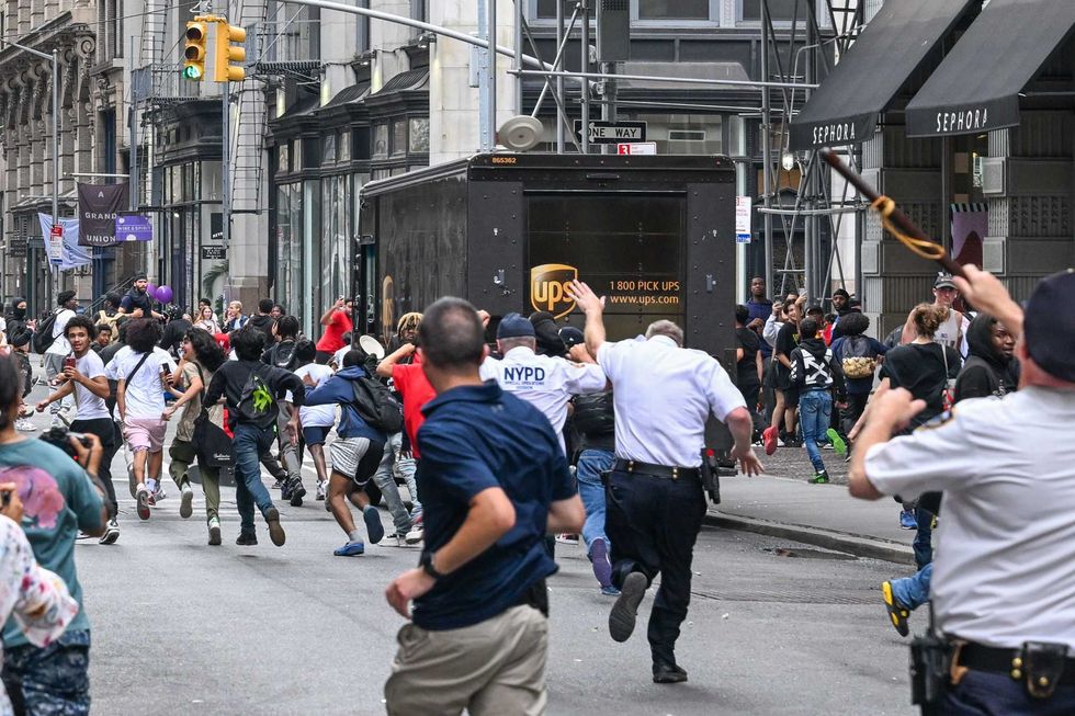 Plates are thrown near Chelsea as members of the NYPD respond to a riot on Aug. 4, 2023