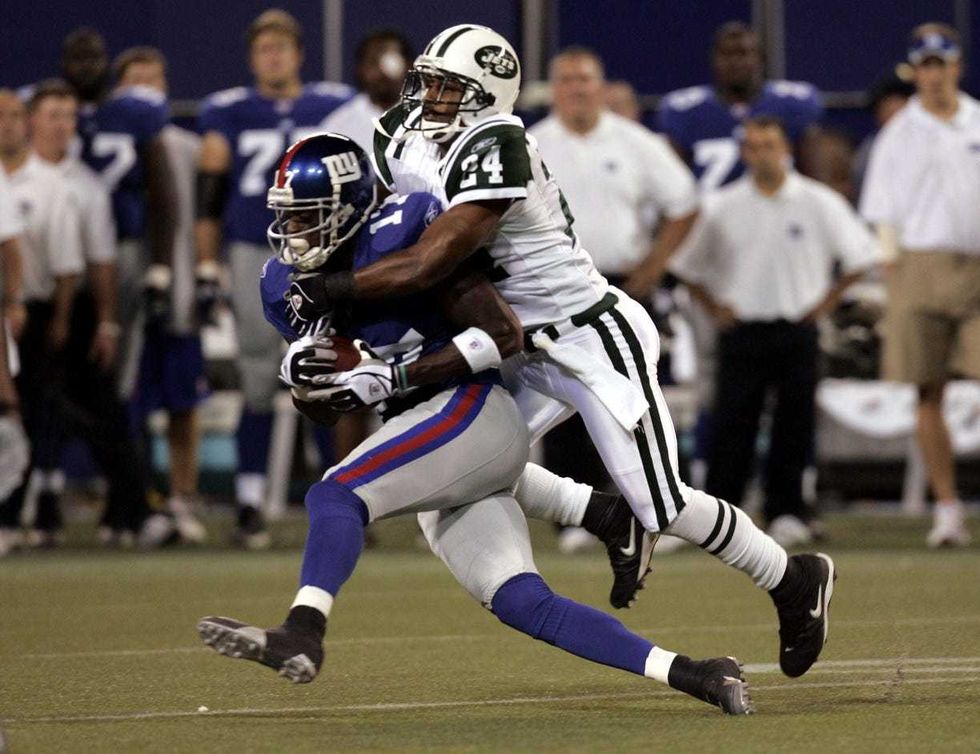 Plaxico Burress and Ty Law
