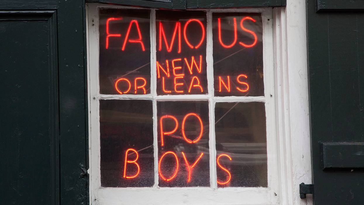 po boy neon sign in window new orleans louisiana