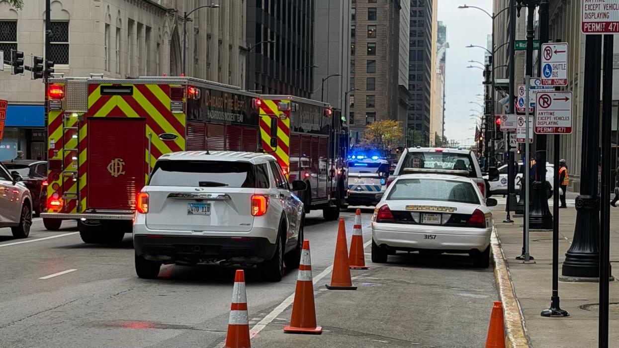 Police and fire vehicles respond to a hazardous materials situation at the Cook County Building, 118 N. Clark St.