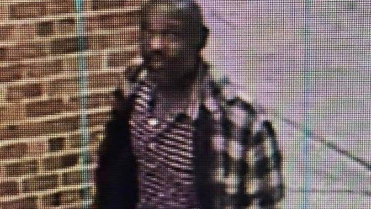 Police are asking for the public's help in identifying a suspect caught on camera after he allegedly stripped copper piping from a high school in Detroit over the weekend.