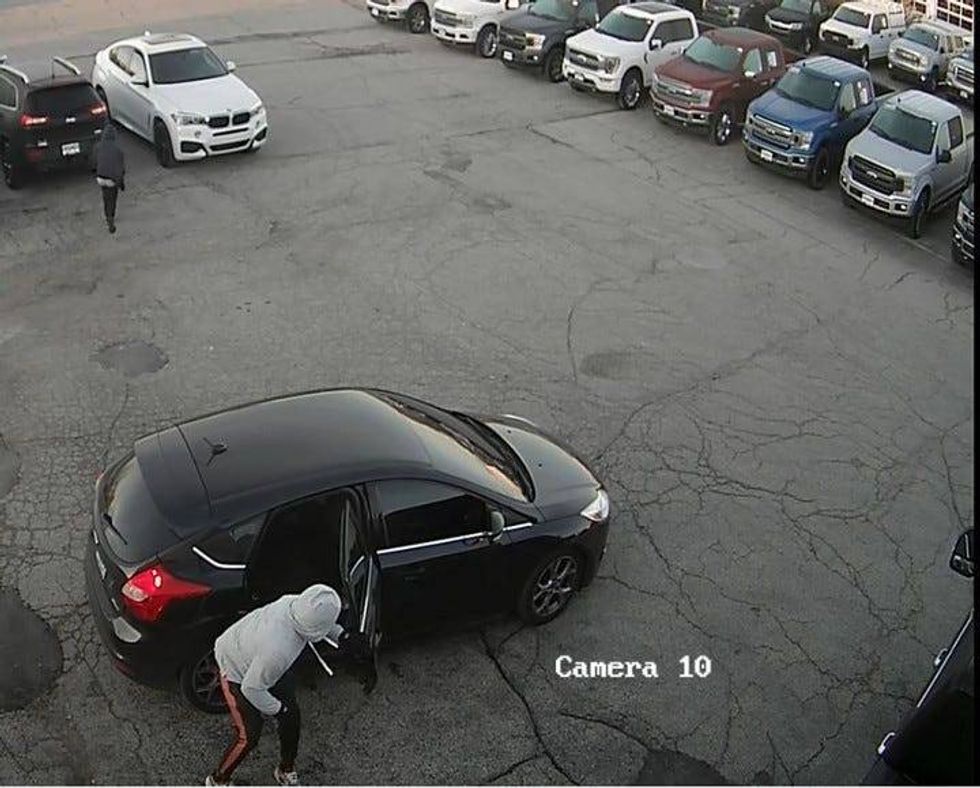 Police are investigating after car thieves hit two north suburban dealerships.