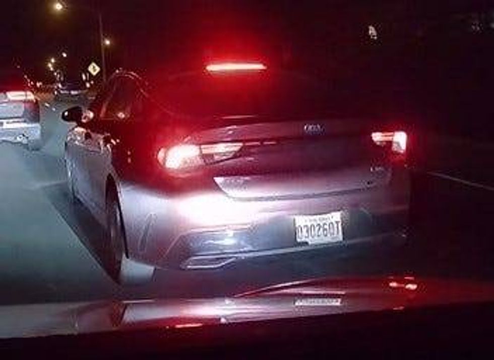 Police are looking for a red Kia involved in the road rage shooting.