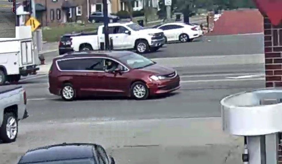 Police are on the hunt for suspects who allegedly fired shots at another vehicle while driving a minivan on the city