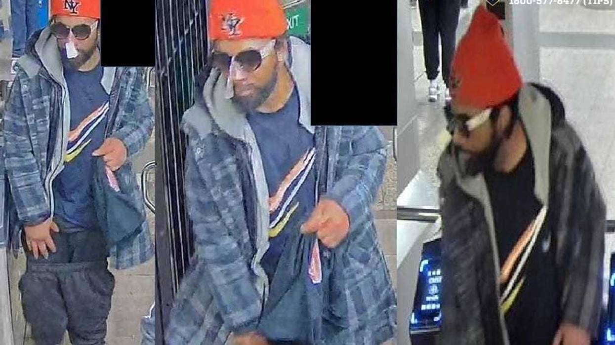 Police are searching for a man suspected of kicking a man onto the subway tracks at Penn Station on Sunday afternoon