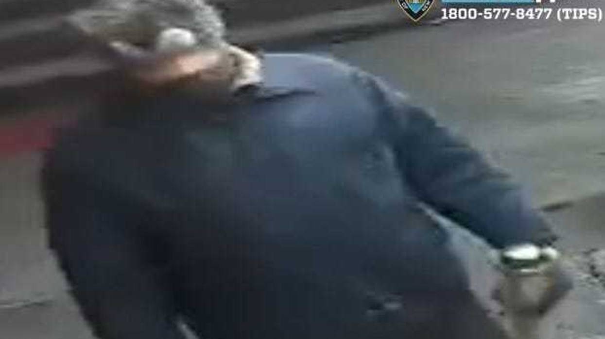 Police are searching for a suspect who allegedly broke a man's eye socket while robbing a Bronx church on Christmas Eve
