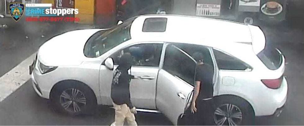 Police are searching for a white Acura SUV in the attack