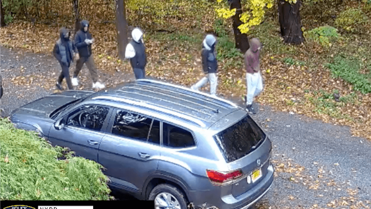 Police are searching for five people in Tuesday's shooting outside Tottenville High School. They believe one of them fired the shots