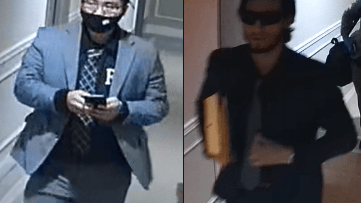 Police are searching for two men who they say posed as FBI agents to rob a couple of a Mercedes, cash and cryptocurrency in Queens