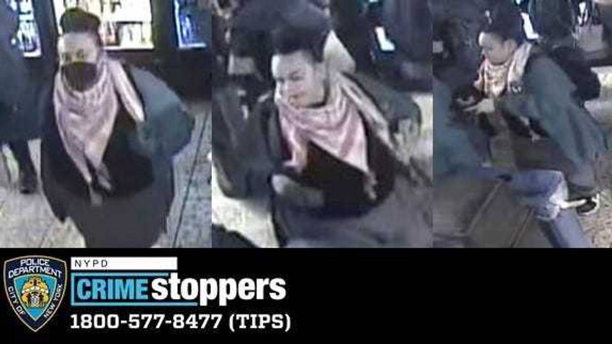 Police are seeking a woman who allegedly threw a bottle at an officer's head, causing minor injuries.