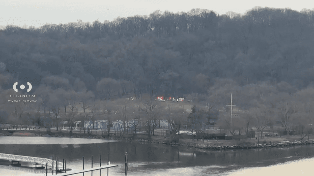 Police are seen at Inwood Hill Park on March 23 after a woman was found dead there