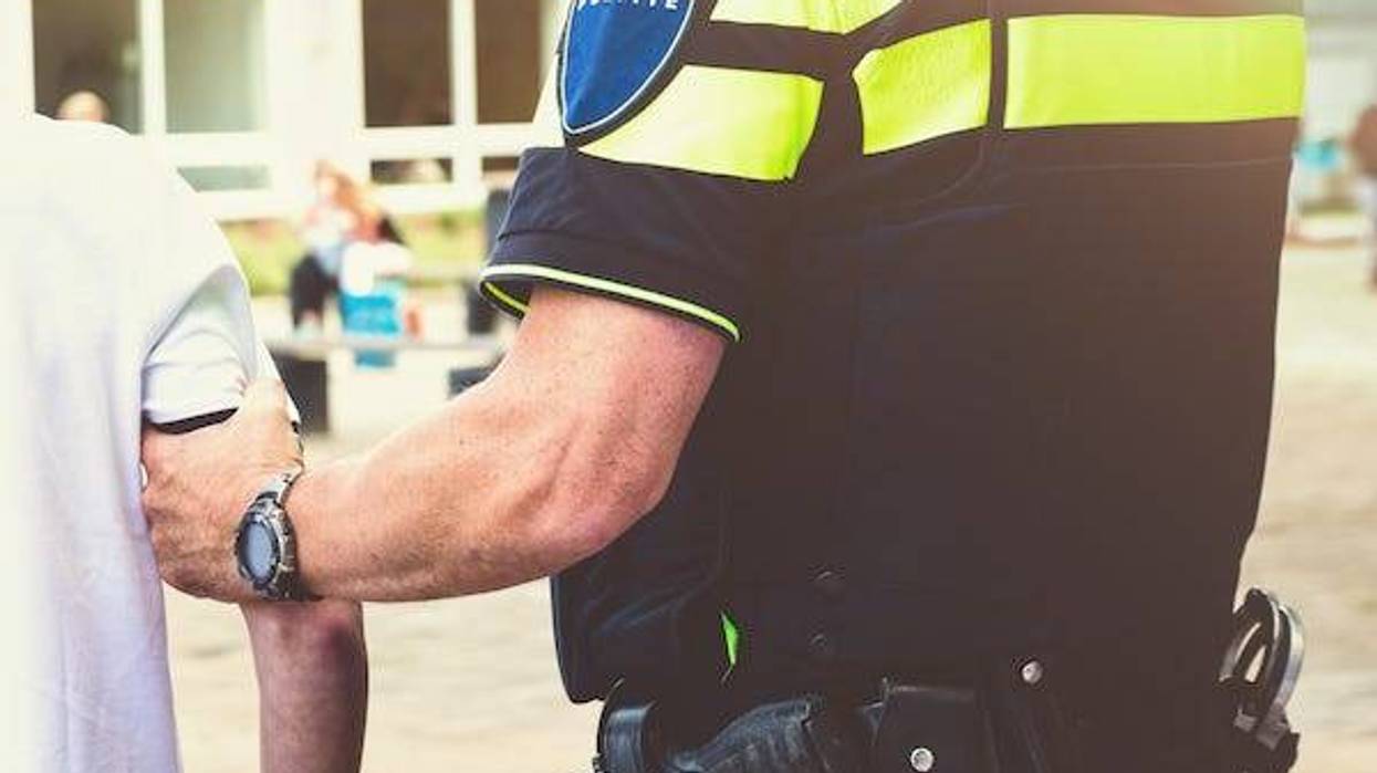 Police arresting boy at school