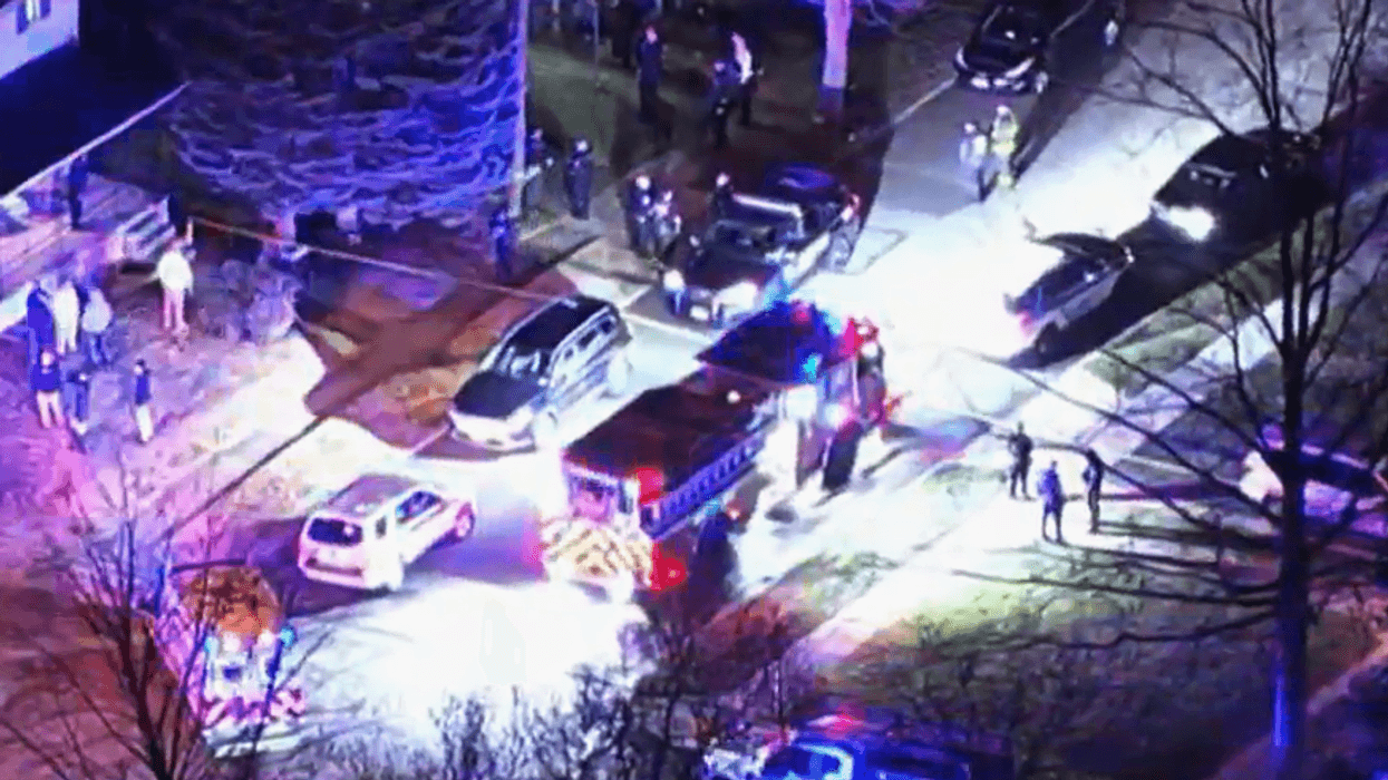 Police at the scene of a shooting Friday in Hamilton Township, N.J.