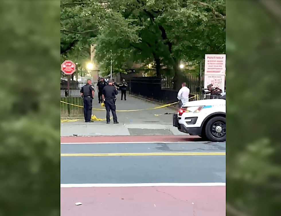 Police at the scene of a shooting that left a 24-year-old woman wounded in the Soundview section of the Bronx on June 19