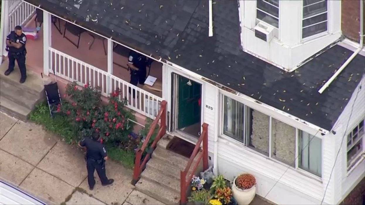 Police at the scene of a shooting that left a child dead