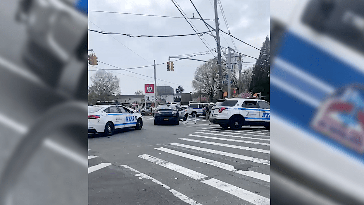 Police at the scene of the officer-involved shooting on Sunday