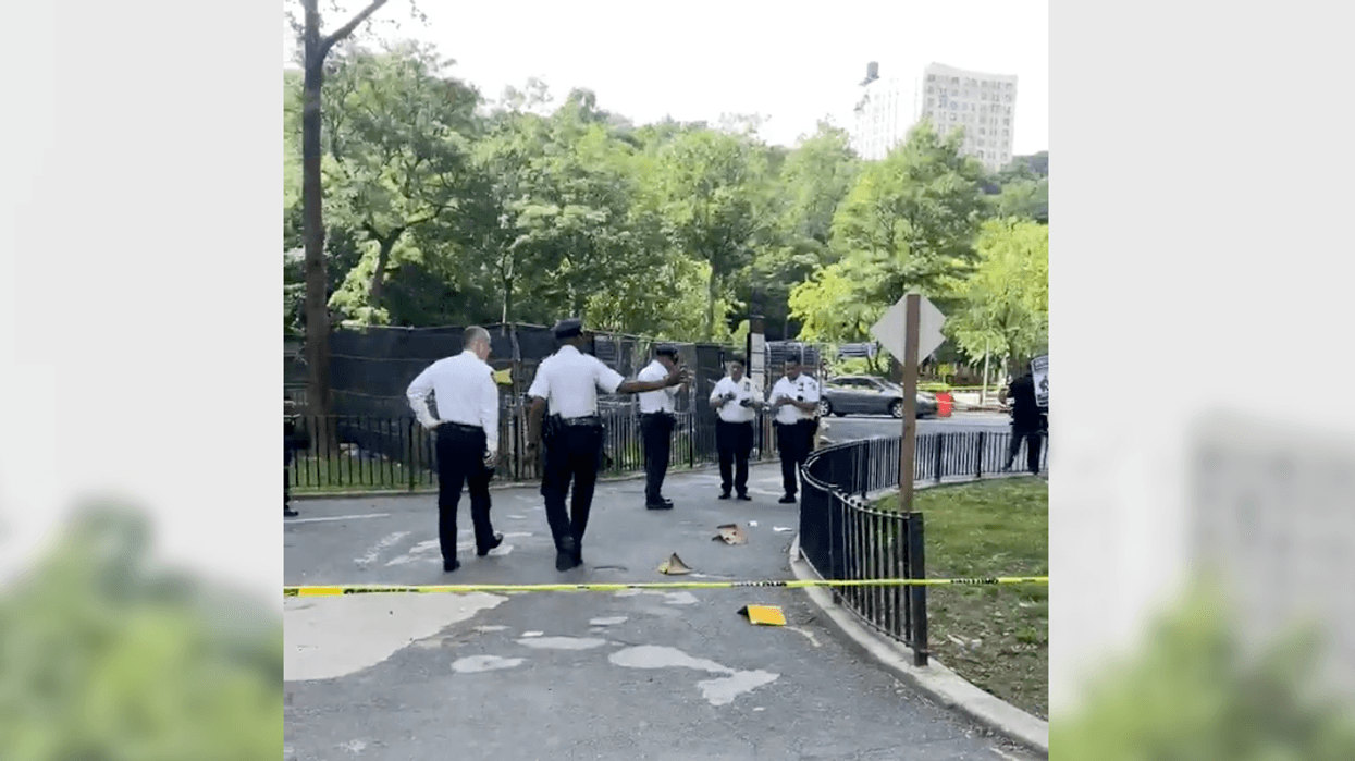 Police at the scene of Wednesday's fatal shooting