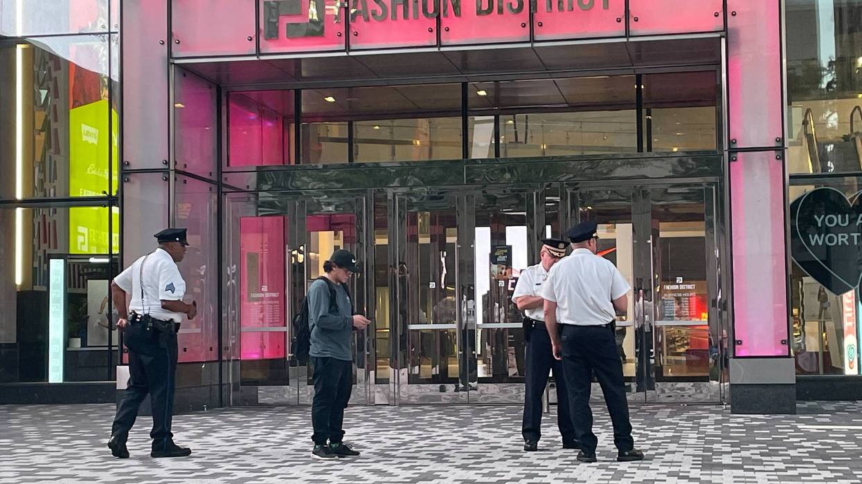 Police at the scene where a shot was fired inside the Fashion District on Sept. 13, 2022.
