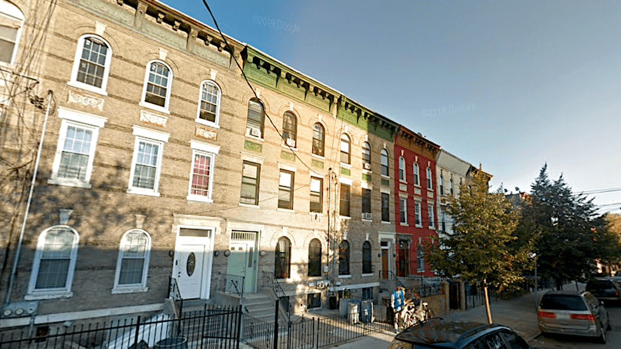 Police believe a man found burned at his home on Wyona Street in East New York was killed