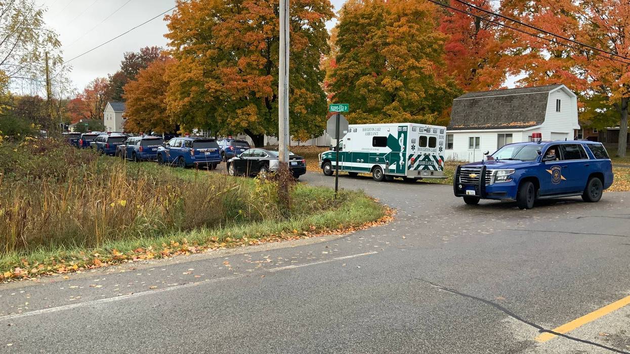 Police cars near barricaded gunman situation
