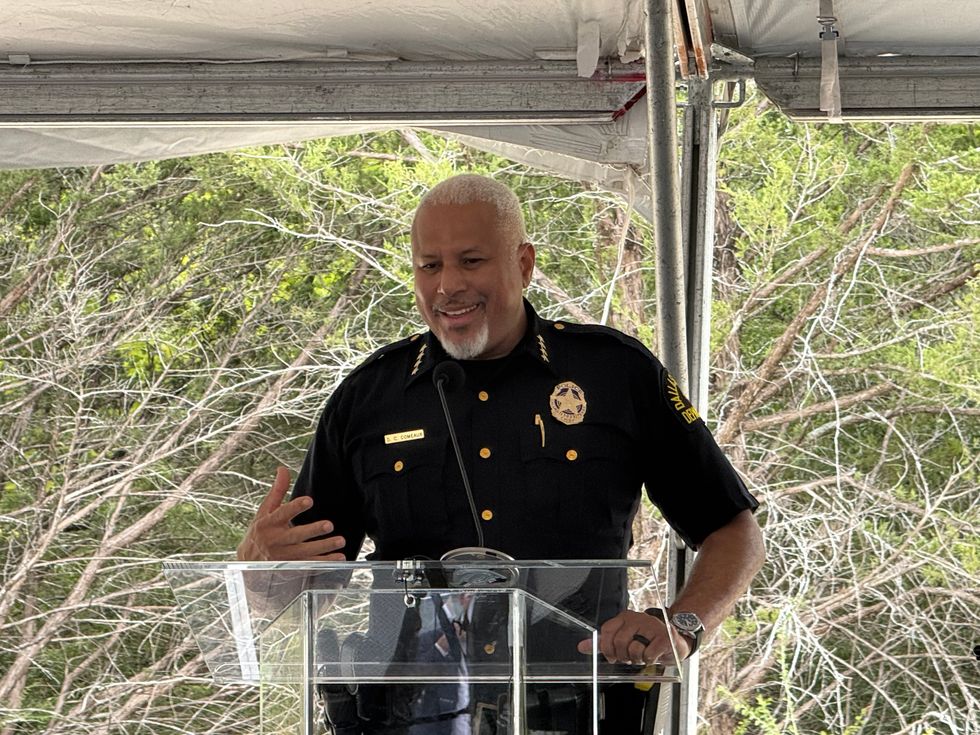 Police Chief Comeaux talking on podium