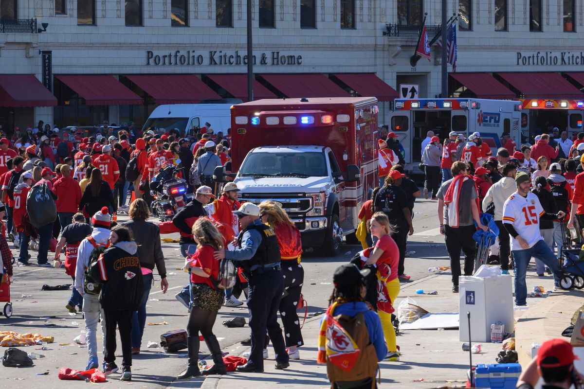 Police clear the area following a shooting at the Kansas City Chiefs NFL football Super Bowl celebration in Kansas City, Mo., Wednesday, Feb. 14, 2024