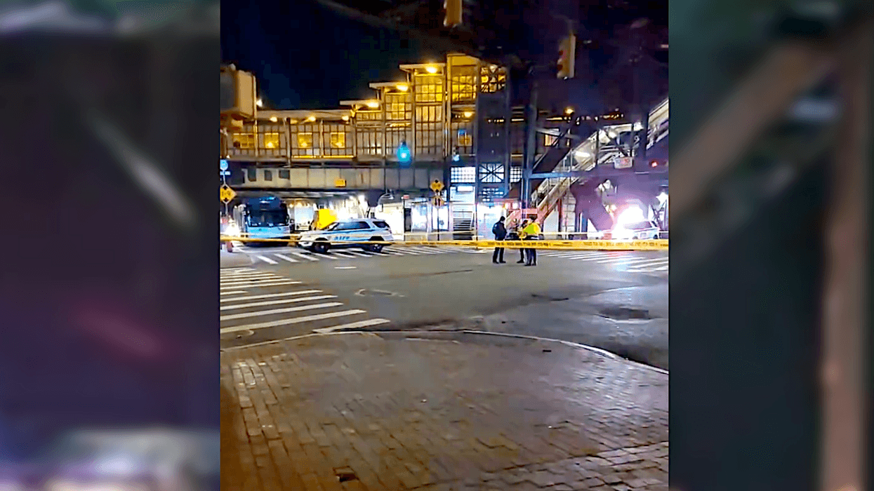 Police closed off the street after a man was critically injured in a hit-and-run crash at Roosevelt Avenue and 61st Street in Woodside