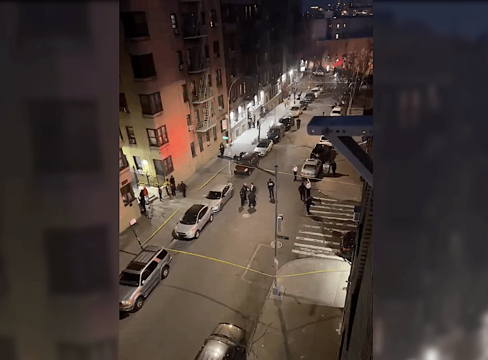 Police cordoned off a street in the Tremont section of the Bronx after a 21-year-old man was shot Wednesday evening