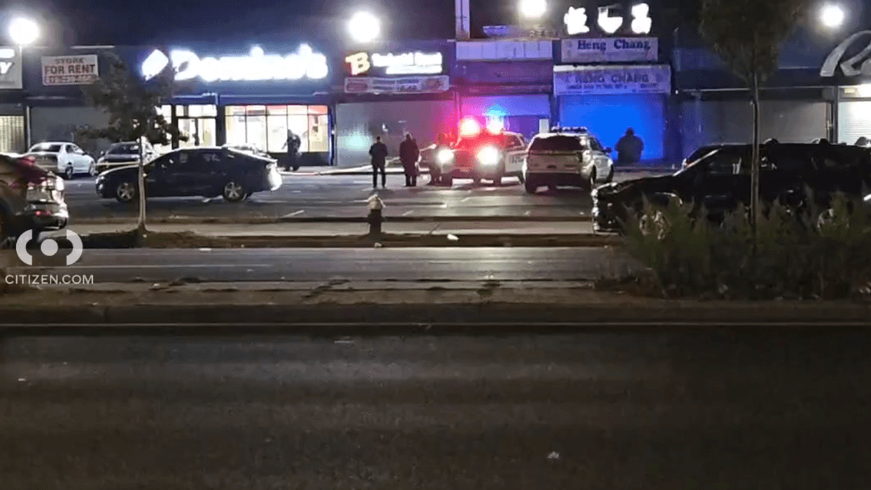 Police cordoned off the parking lot with crime scene tape and investigated into the morning