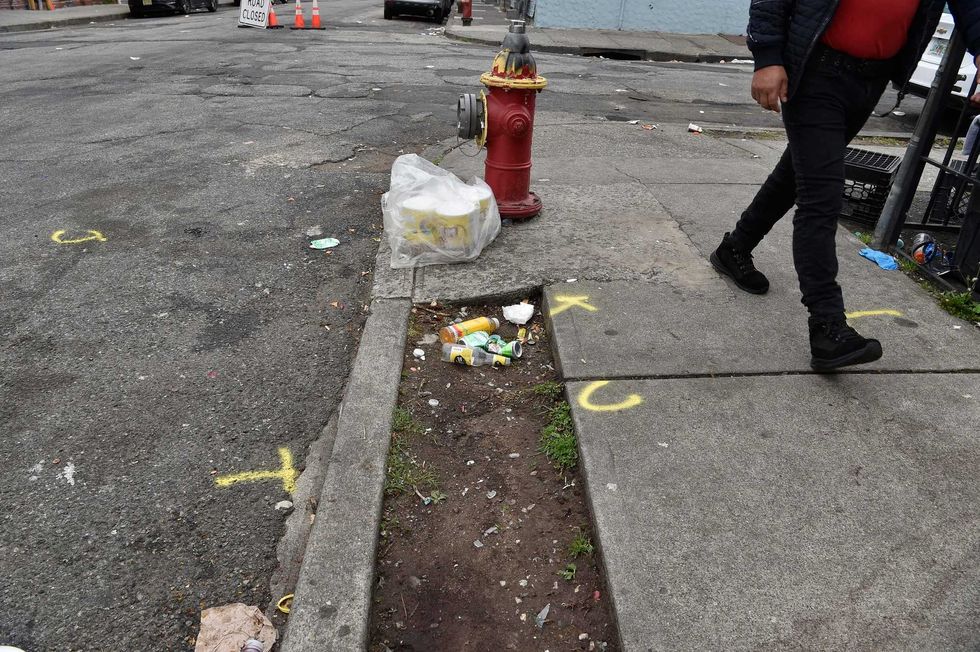 Police found the 15-year-old girl lying in front of 36 Essex St. with a gunshot wound to her head
