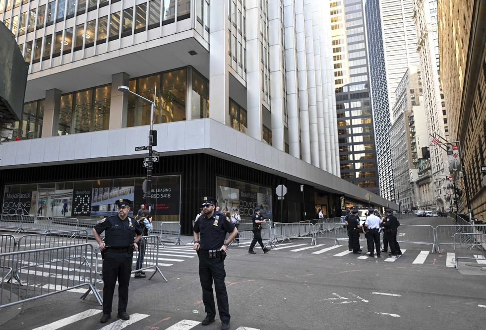 Police guard the New York attorney general