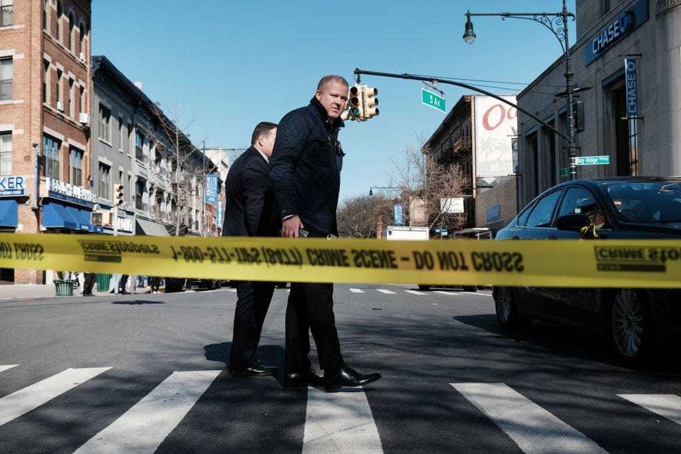 : Police investigate at an intersection after a man driving a U-Haul truck struck several pedestrians in the Bay Ridge neighborhood in Brooklyn on February 13, 2023 in New York City.